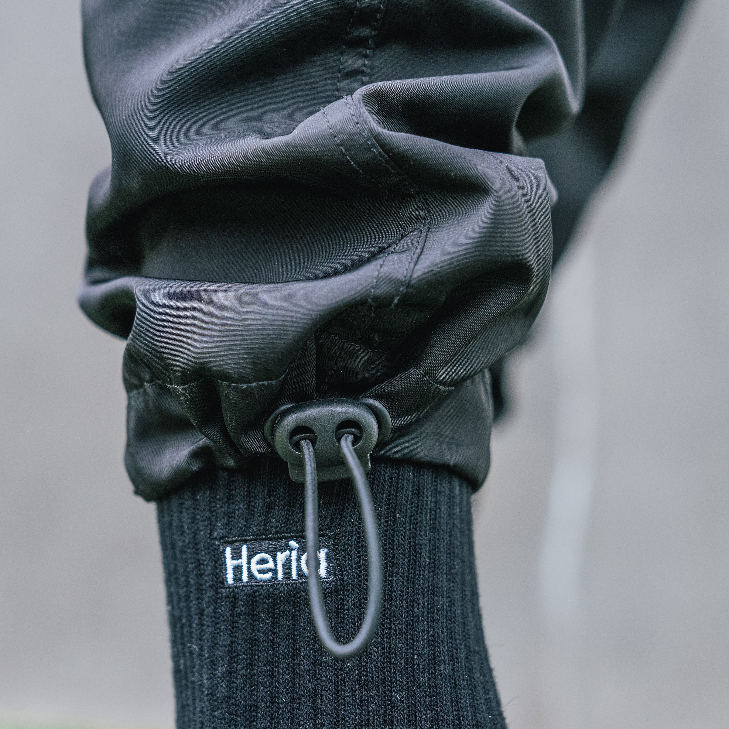 トップス neith. Gathered Track Pants(Black) all-over-print-unisex-track-